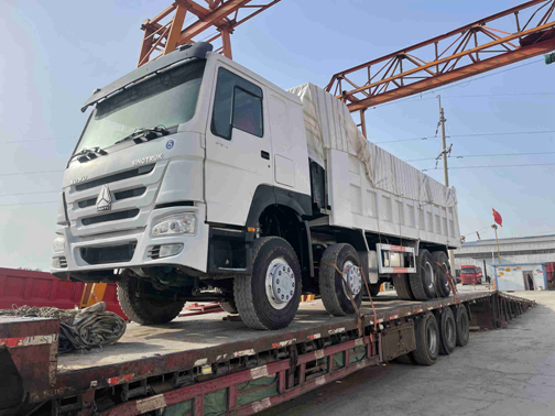 HOWO dump truck Loading into sea port Sinotruck 8*4 left hand drive